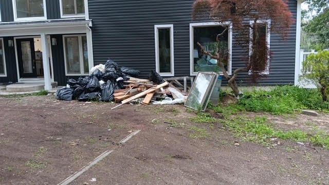 Cluttered property before Cigna cleanup service