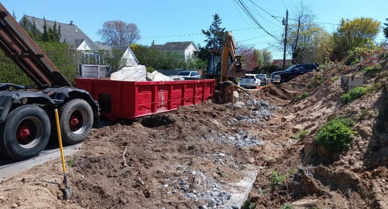 Roll-off container at construction site on Long Island